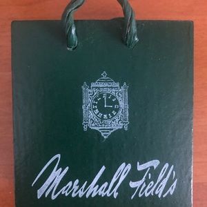 NWOT. Vintage Marshall Field’s green shopping bag Christmas ornament.